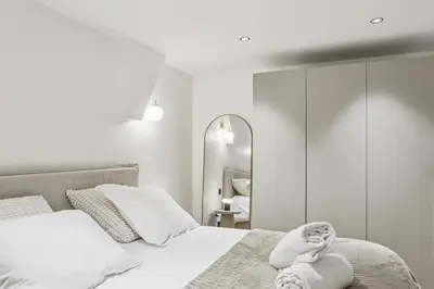 Un ou plusieurs lits dans un hébergement de l'établissement Superbe appartement en hypercentre avec climatisation