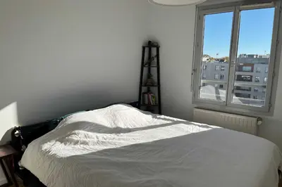 Un ou plusieurs lits dans un hébergement de l'établissement Premium apartment with views of Lyon