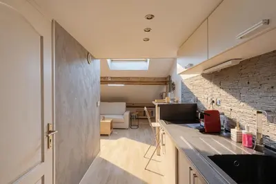 Cuisine ou kitchenette dans l'établissement Le Repaire Des Toits - Villeurbanne - Proximité Lyon