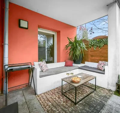 Coin salon dans l'établissement Bel appartement avec grande terrasse