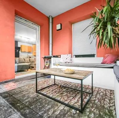 Coin salon dans l'établissement Bel appartement avec grande terrasse