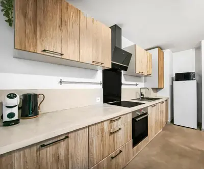 Cuisine ou kitchenette dans l'établissement Bel appartement avec grande terrasse
