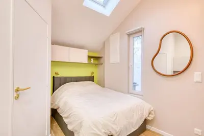 Un ou plusieurs lits dans un hébergement de l'établissement La Chambre Lyonnaise - Studio - Centre Lyon