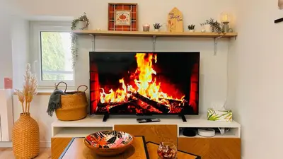 Télévision ou salle de divertissement dans l'établissement T3 Chaleureux à 250m de la gare - 10 min du centre