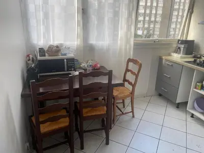Cuisine ou kitchenette dans l'établissement Chambre dans un appartement en colocation