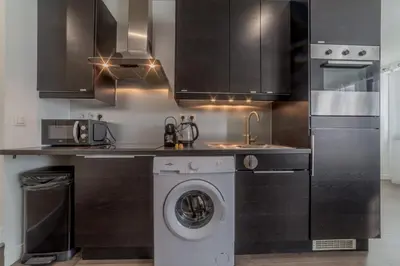 Cuisine ou kitchenette dans l'établissement Superbe appartement cosy & design - Lyon 6ème