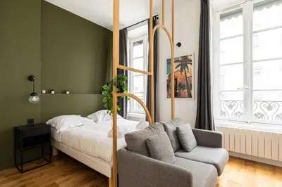 Un ou plusieurs lits dans un hébergement de l'établissement Cosy studio - 2P - Bellecour