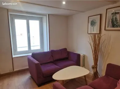Coin salon dans l'établissement Appartement dans maison de village