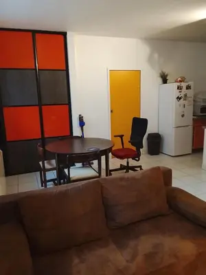 Coin salon dans l'établissement Appartement T2