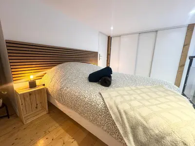 Un ou plusieurs lits dans un hébergement de l'établissement Jubin Duplex