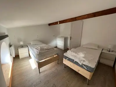 Un ou plusieurs lits dans un hébergement de l'établissement Duplex spacieux au centre du village 205