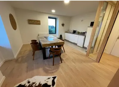 Cuisine ou kitchenette dans l'établissement La table du Musée