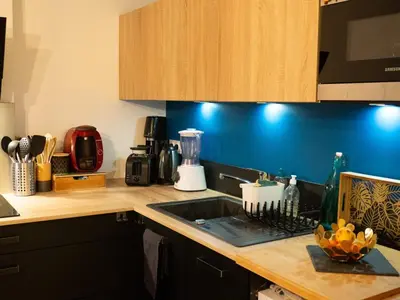 Cuisine ou kitchenette dans l'établissement Cozy confortable calm