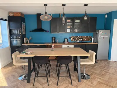 Cuisine ou kitchenette dans l'établissement Charmant Appartement Terrasse et parking