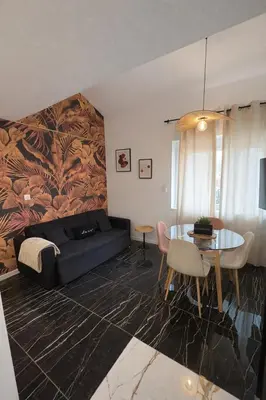 Coin salon dans l'établissement Lyon Est - Parking Gratuit et Aéroport - 13 min
