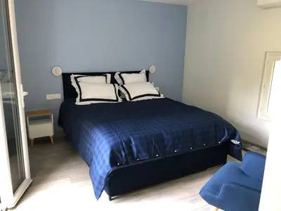 Un ou plusieurs lits dans un hébergement de l'établissement 1 chambre indépendante dans maison