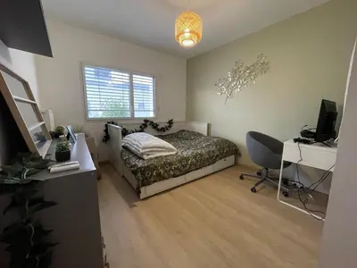 Un ou plusieurs lits dans un hébergement de l'établissement Modern house with terrace Professional comfort