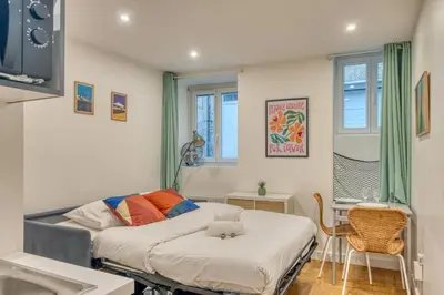 Un ou plusieurs lits dans un hébergement de l'établissement LAristote - Studio cosy - Proche de Lyon - Wifi inclus