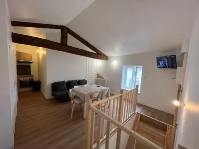 Un ou plusieurs lits dans un hébergement de l'établissement Signature Apartment