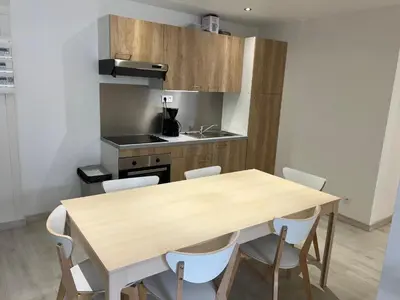 Cuisine ou kitchenette dans l'établissement Signature Apartment