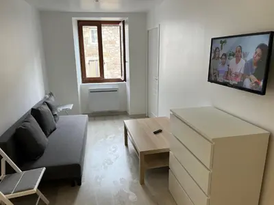 Télévision ou salle de divertissement dans l'établissement Signature Apartment
