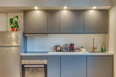 Cuisine ou kitchenette dans l'établissement Le Descartes - Sainte-Foy - Proche de Lyon - WiFi inclus