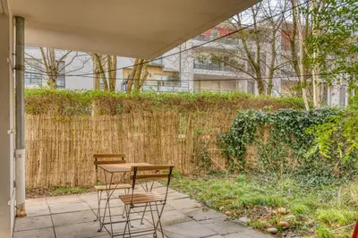 Jardin de l'établissement LAtmosphère Agréable T2 avec terrasse 2 pers Tram T5