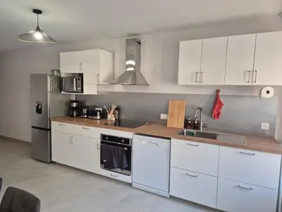 Cuisine ou kitchenette dans l'établissement Séjour au cœur des Pierres Dorées