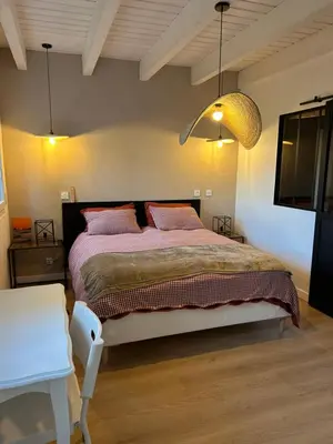 Un ou plusieurs lits dans un hébergement de l'établissement Le Cottage