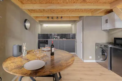 Cuisine ou kitchenette dans l'établissement Loft Industriel & Vintage