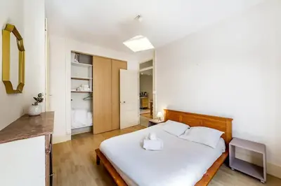 Un ou plusieurs lits dans un hébergement de l'établissement BnGo I Le Central & Cosy I 4p, Centre-ville, Balcon