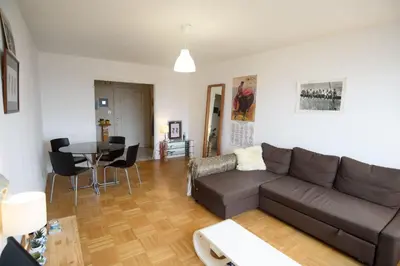 Coin salon dans l'établissement Lyon 7 60m 4 pers Ascenseur Proche transports