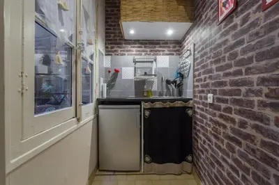 Cuisine ou kitchenette dans l'établissement Le 27 L