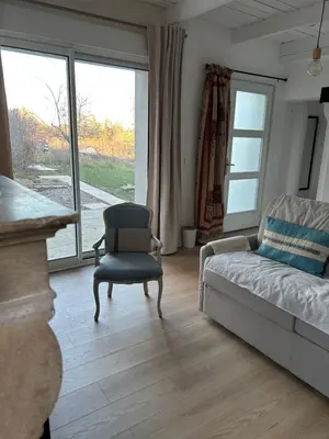 Un ou plusieurs lits dans un hébergement de l'établissement Le Cottage