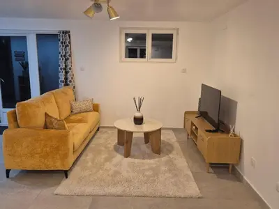 Coin salon dans l'établissement Studio2 cosy indépendant calme proche Lyon