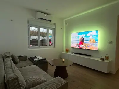 Télévision ou salle de divertissement dans l'établissement Elegant apartment