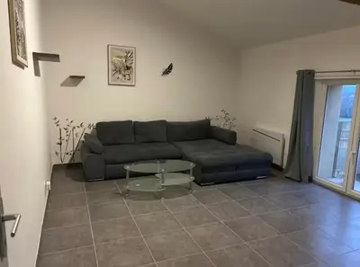 Coin salon dans l'établissement Chez aurelie