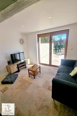 Coin salon dans l'établissement Parenthèse en Dombes Maison au calme avec jardin