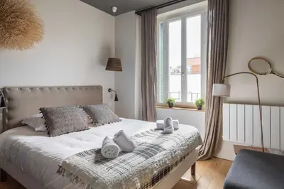 Un ou plusieurs lits dans un hébergement de l'établissement DIFY Art Déco - Charpennes