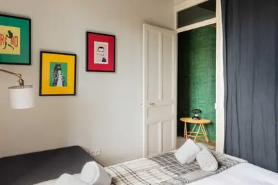 Un ou plusieurs lits dans un hébergement de l'établissement DIFY Art Déco - Charpennes
