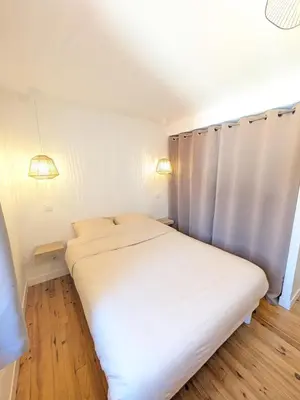 Un ou plusieurs lits dans un hébergement de l'établissement La Tour - Appartement rénové, calme et confortable