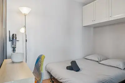 Un ou plusieurs lits dans un hébergement de l'établissement Superbe apt Lyon 8ème Terrasse parking privé