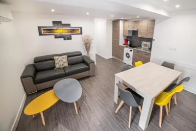 Cuisine ou kitchenette dans l'établissement Appartement Sun GroupamaLyon Eurexpo