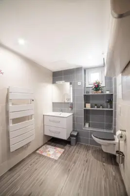 Un ou plusieurs lits dans un hébergement de l'établissement Appartement Sun GroupamaLyon Eurexpo
