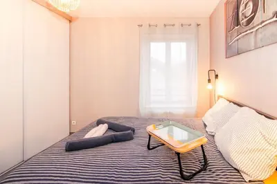 Un ou plusieurs lits dans un hébergement de l'établissement Chic Stopover L'Olivier City Center & Flavors