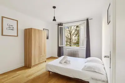 Un ou plusieurs lits dans un hébergement de l'établissement Superbe Appartement T3 - Cosy & Spacieux - Lyon 6e, Brotteaux