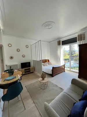 Coin salon dans l'établissement Maison bourgeoise & spa - 26 personnes