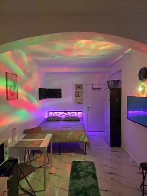 Un ou plusieurs lits dans un hébergement de l'établissement Studio modern climatise