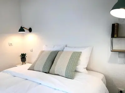 Un ou plusieurs lits dans un hébergement de l'établissement HOSTELLERIE DES BICHONNIERES