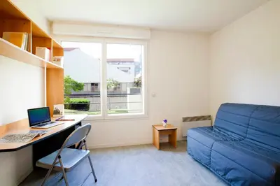 Coin salon dans l'établissement Séjours & Affaires Lyon Saint-Nicolas